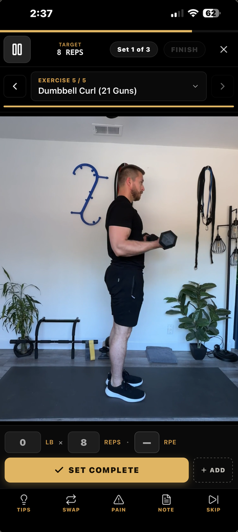 Yardline workout player: target reps and set counter above a demo video of a dumbbell curl